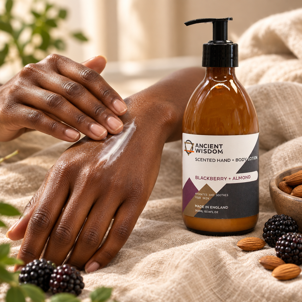 Deep-brown hands rubbing in Blackberry and Almond lotion